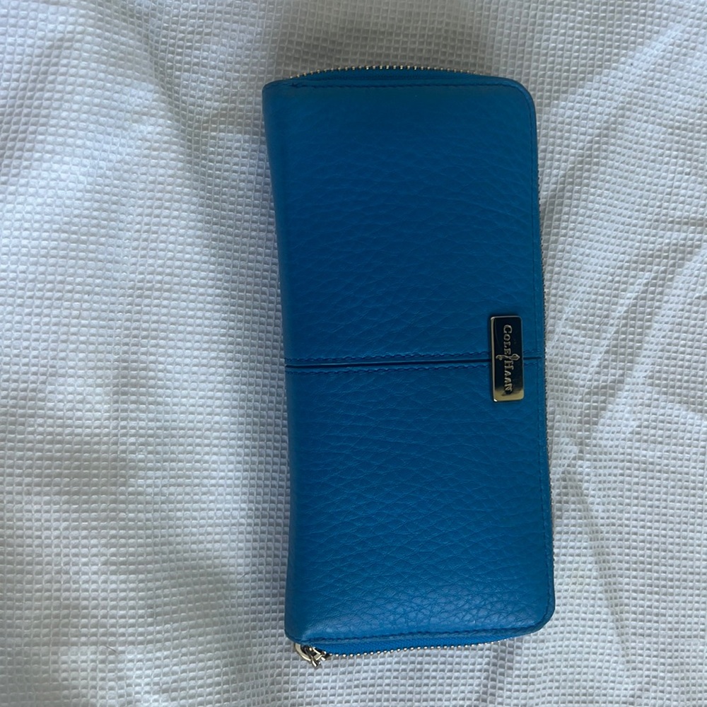 Turquoise Coke Haan women’s leather wallet